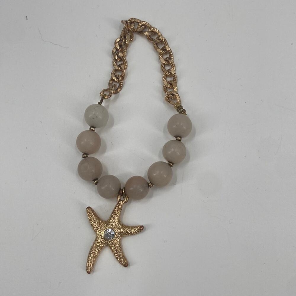 Star Fish beaded gold tone bracelet